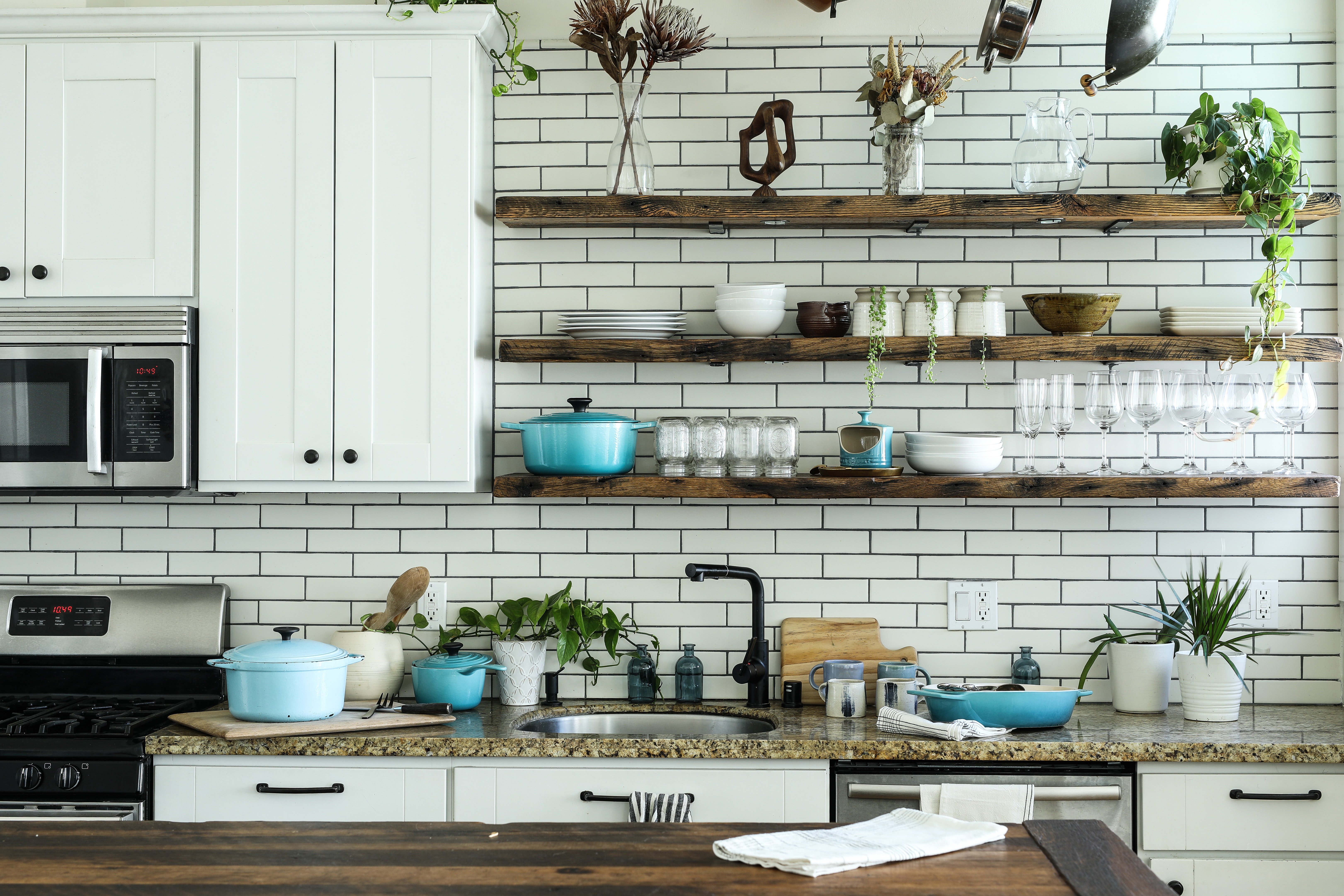Open shelving kitchen with a personal touch