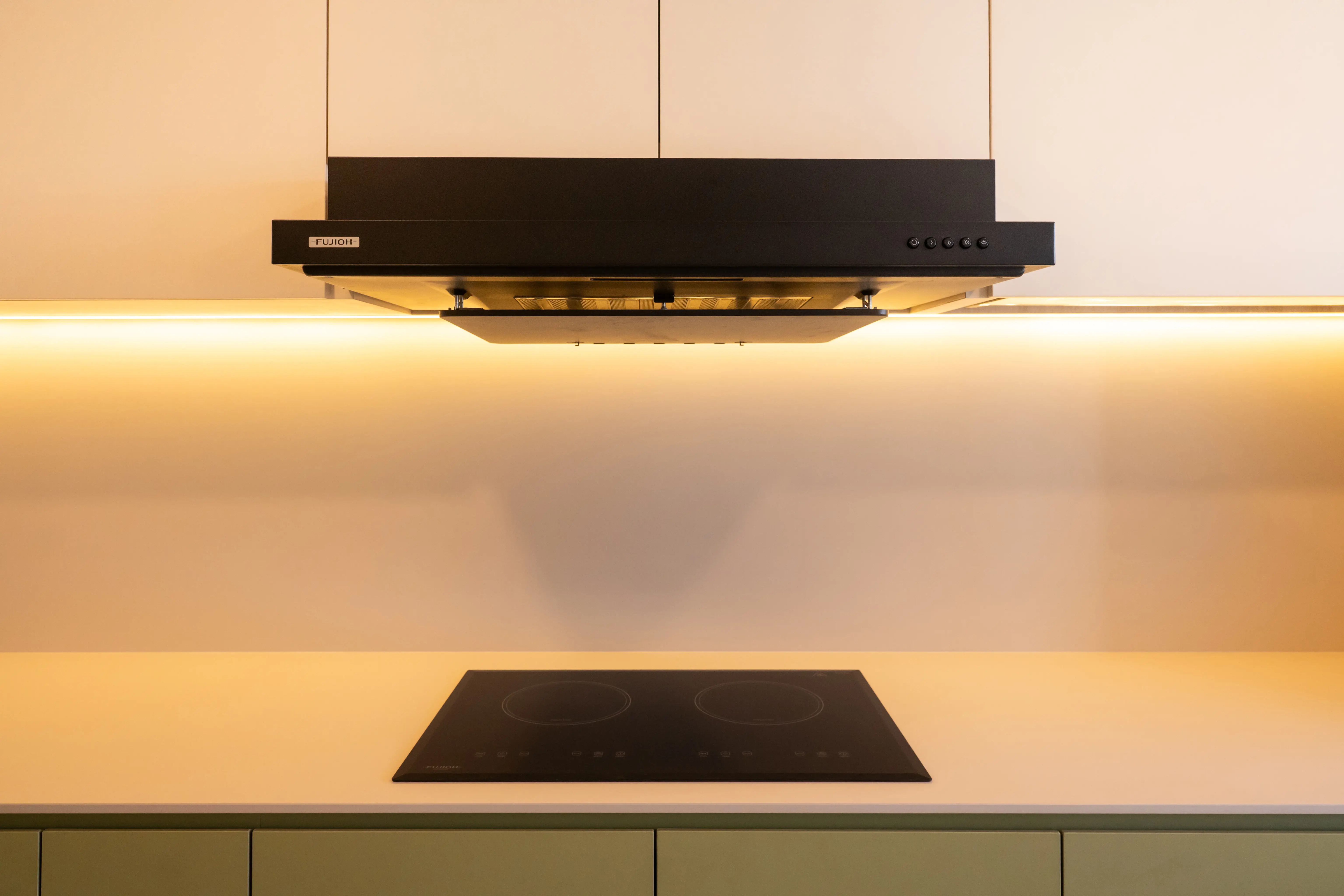 Sleek Black Cooker Hood and Hob.webp