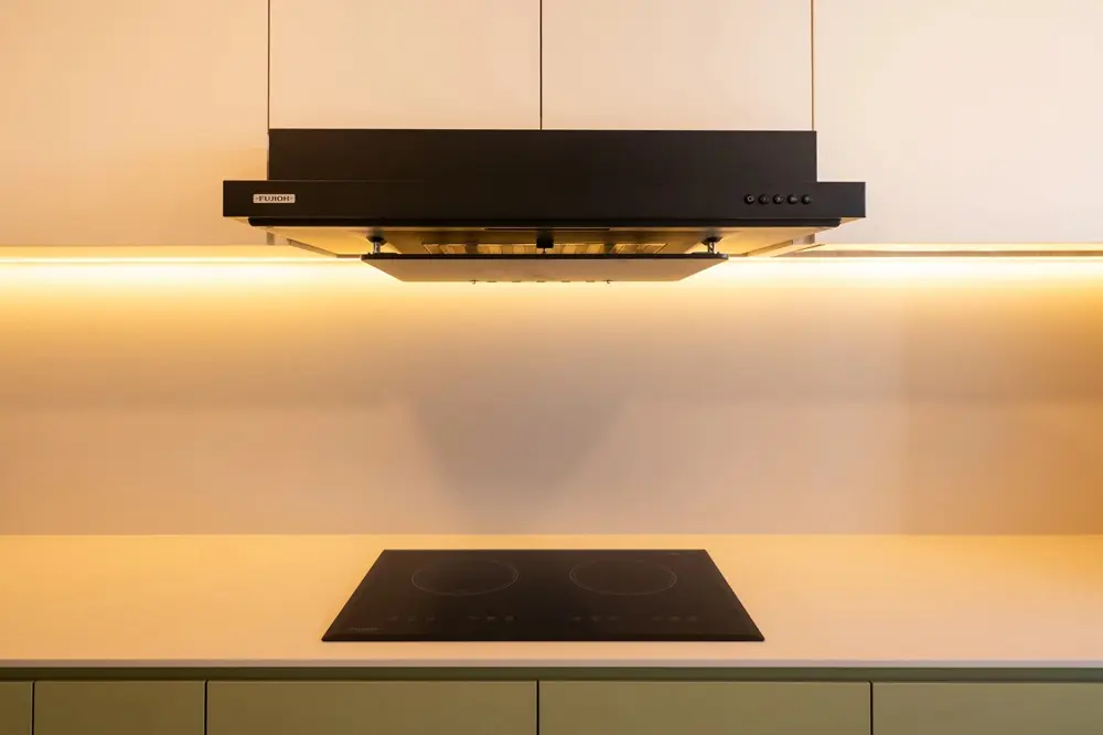 Sleek Black Cooker Hood and Hob.webp